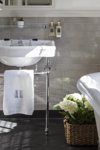 Bath sink and towel in Hurley house bathroom