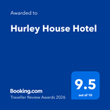 Hurley House - A blue award graphic reads: Awarded to Hurley House Hotel, with a Booking.com logo, Traveller Review Awards 2026, and a large 9.5 out of 10 rating displayed.